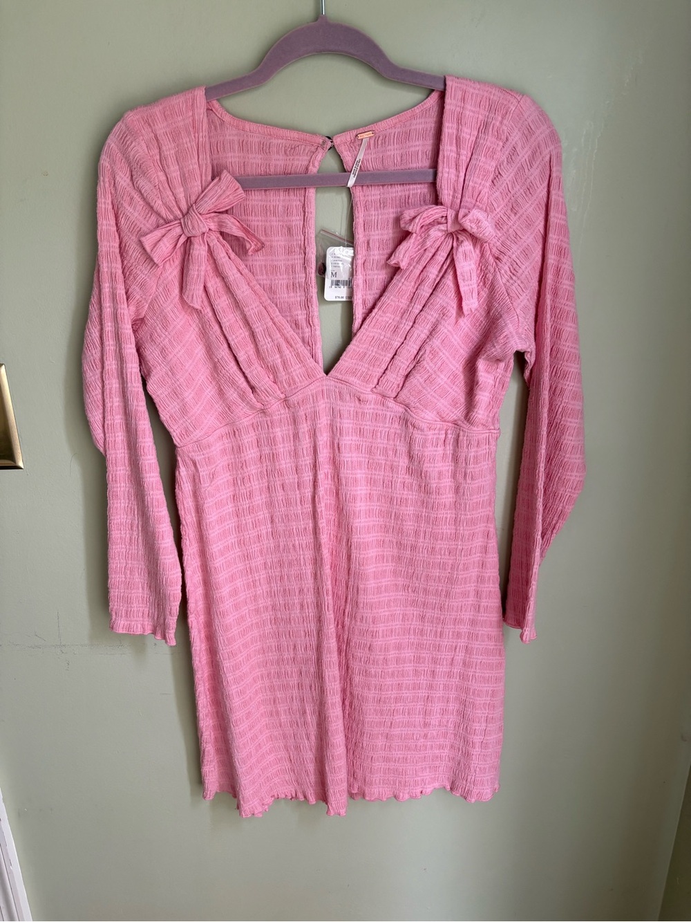NWT Free People Palina Minidress. Pink Sz M Textured Knit with Front Bow Details